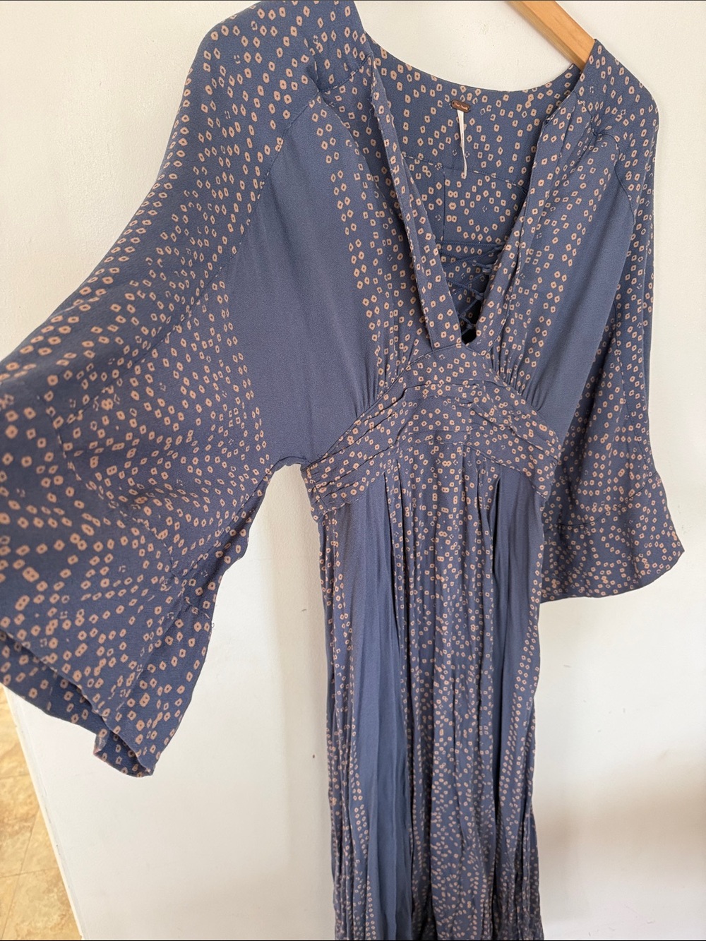 Free People . Greyish/blue dress with light pink circle pattern.